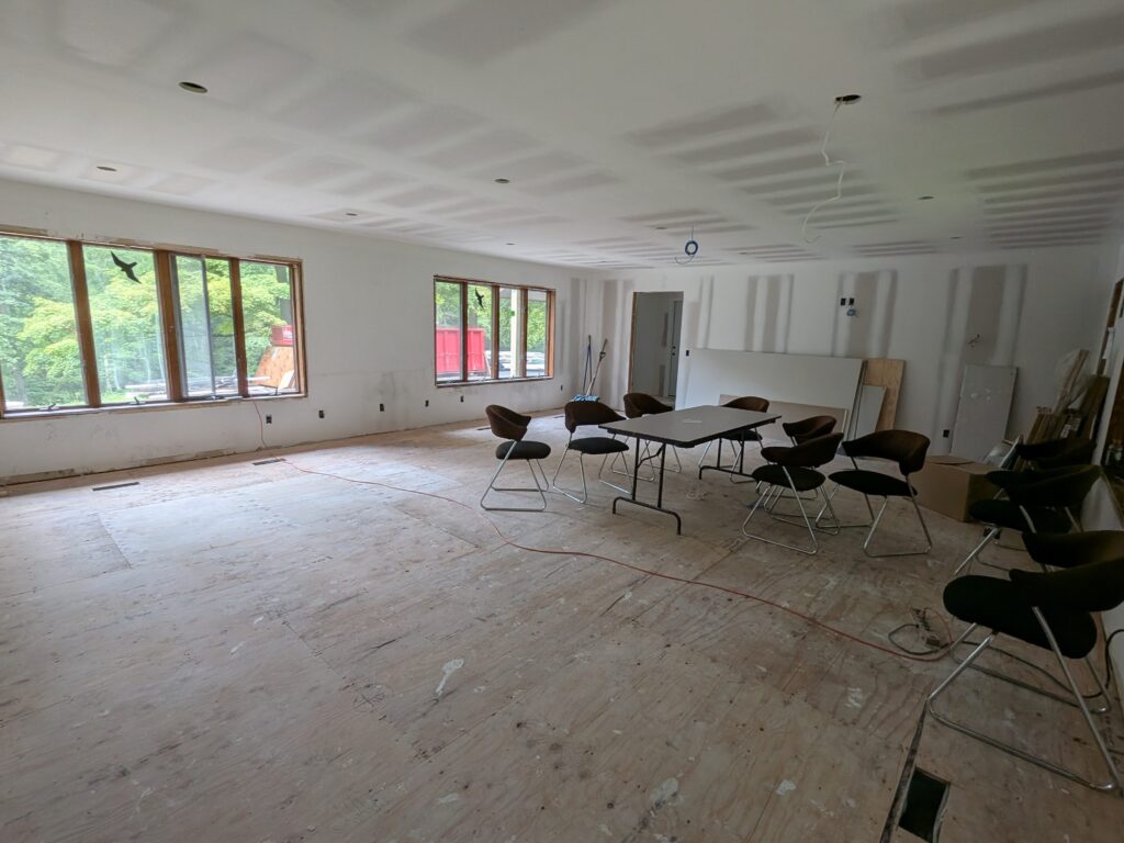 Newly drywalled room under construction